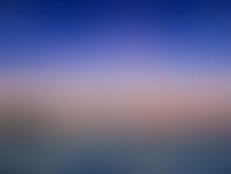 Skiff running at sunset
