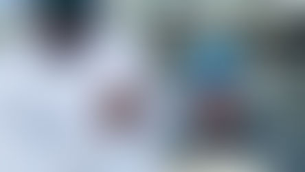 Travis Sands with a copy of the Book