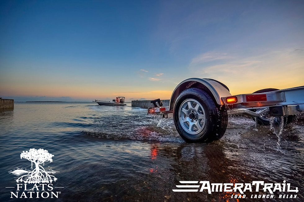 Amera Trail Trailer getting pulled back up the ramp after launching the skiff