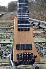 Manton Customs Navigator 8 String Headless Travel Guitar  (1).JPG