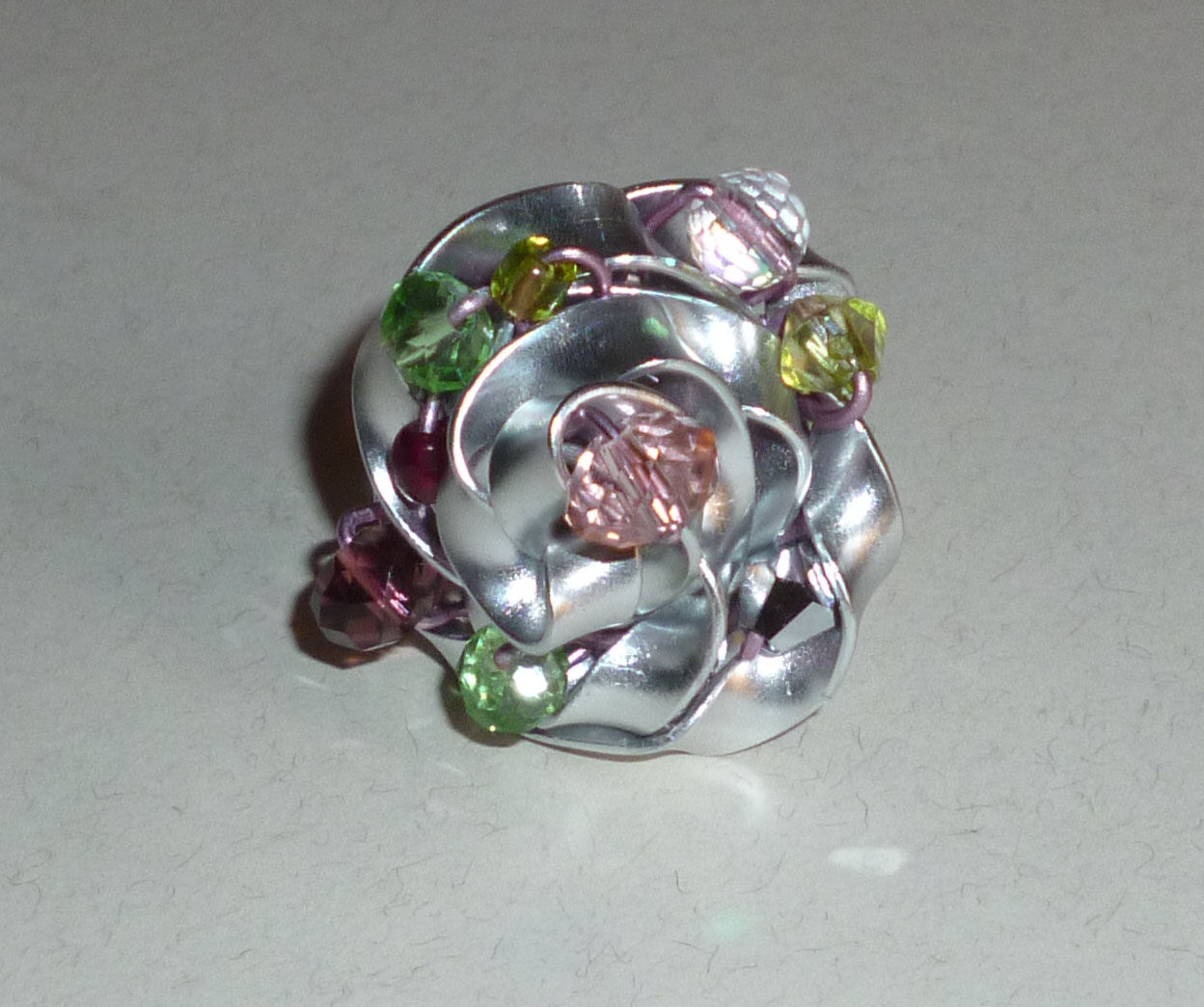Anillo Rosa Metal. talla 9.5.