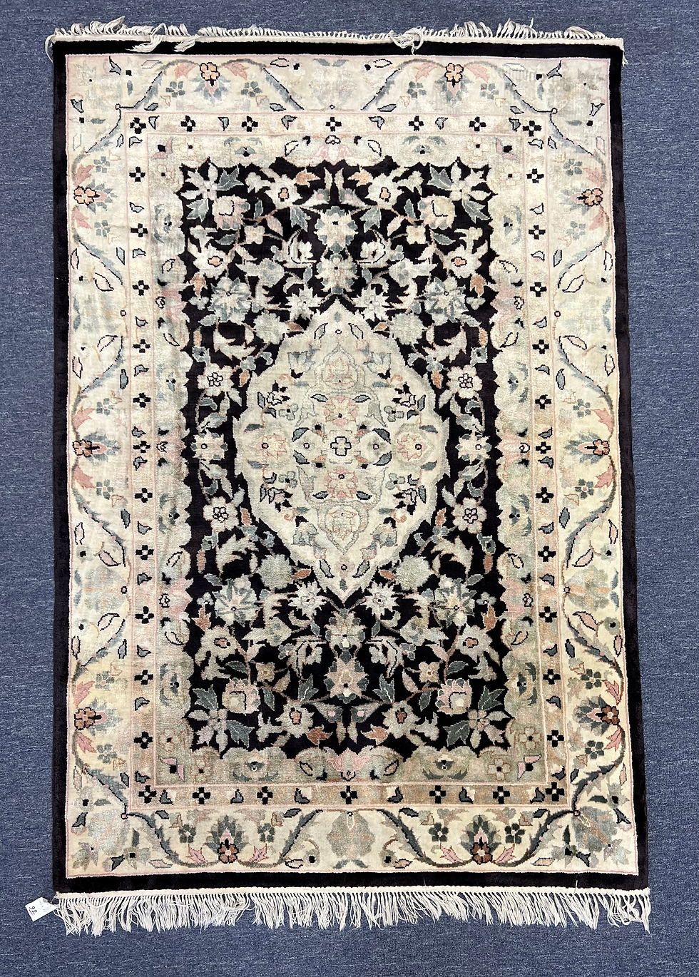 Hand knotted silk rug