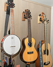 Hanging ukuleles on wall