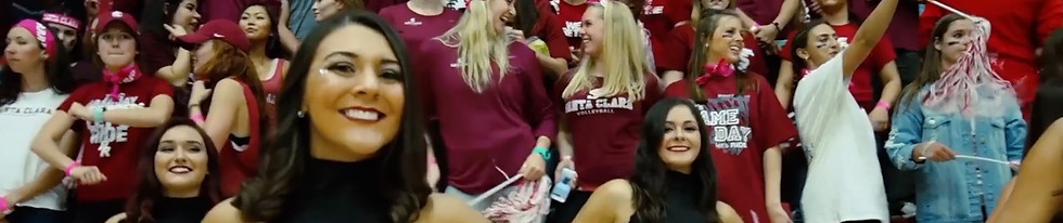 Crowd of excited SCU students and cheerleaders
