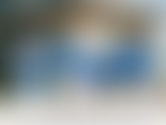 Professional painters team in front of building