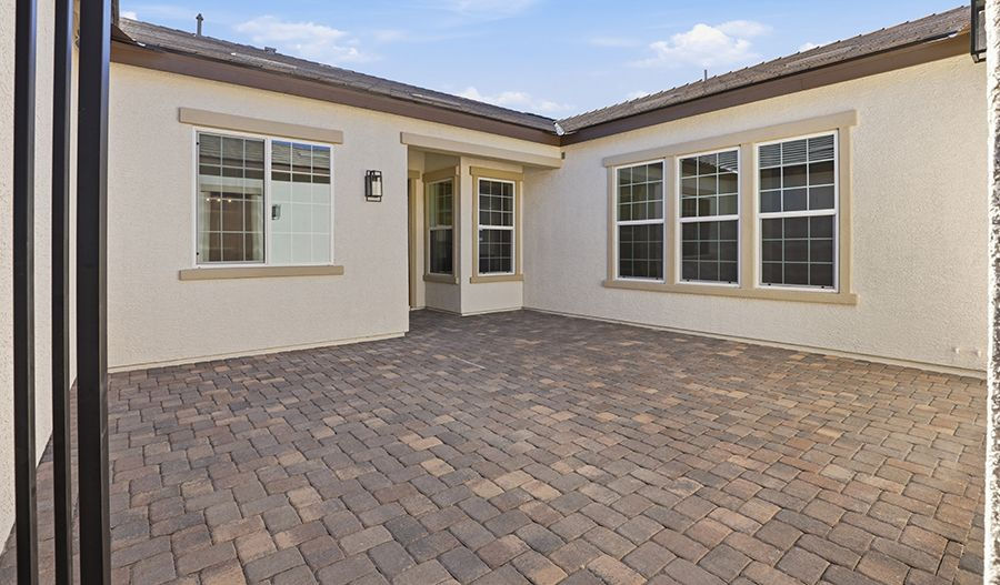 Rowan courtyard at Cactus Bloom — representative builder imagery