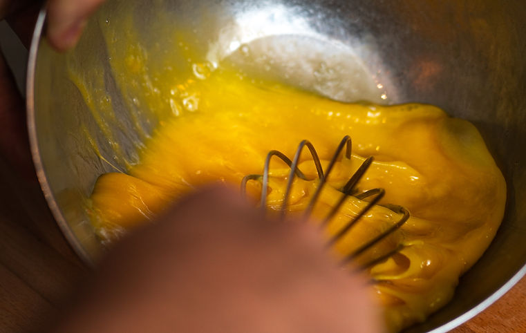 mixing-eggs-in-bowl-by-robin-nalaka-daundaratne.jpg