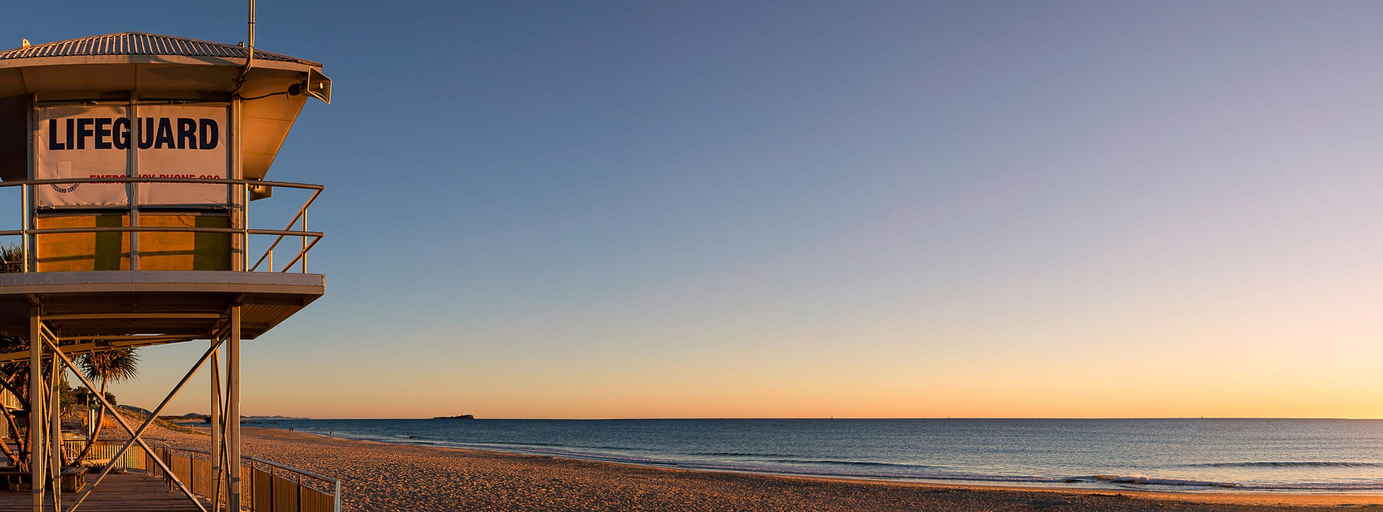 Maroochydore beach with a lifesaving tower