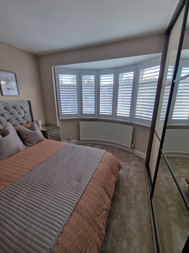 Plantation Shutters in a bedroom