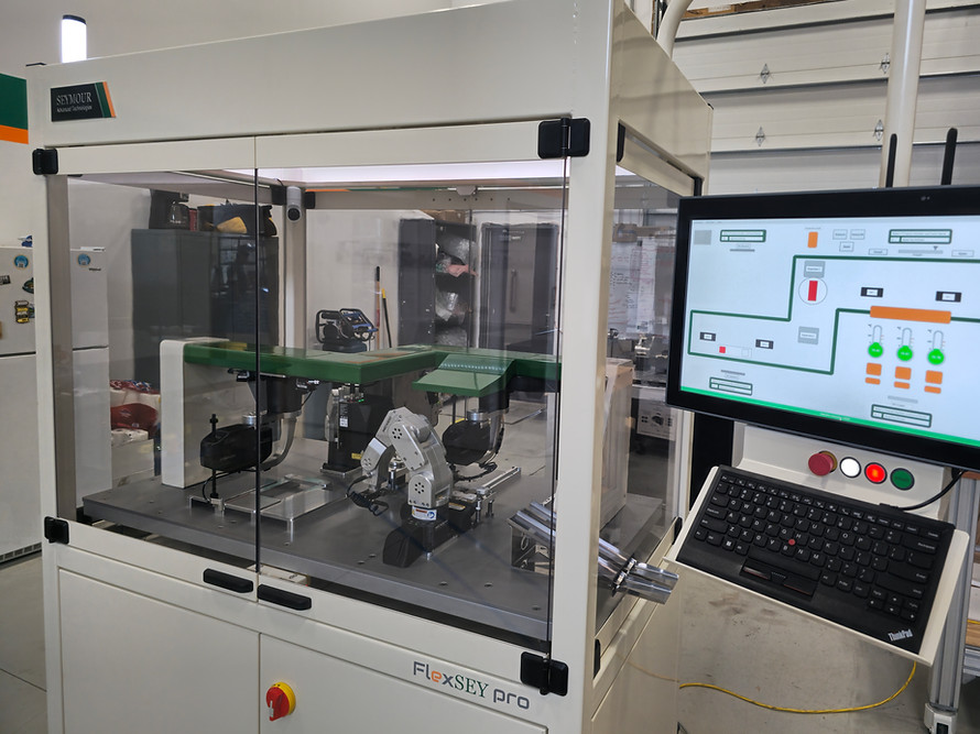 Custom industrial automation machine built by SEYMOUR Advanced Technologies