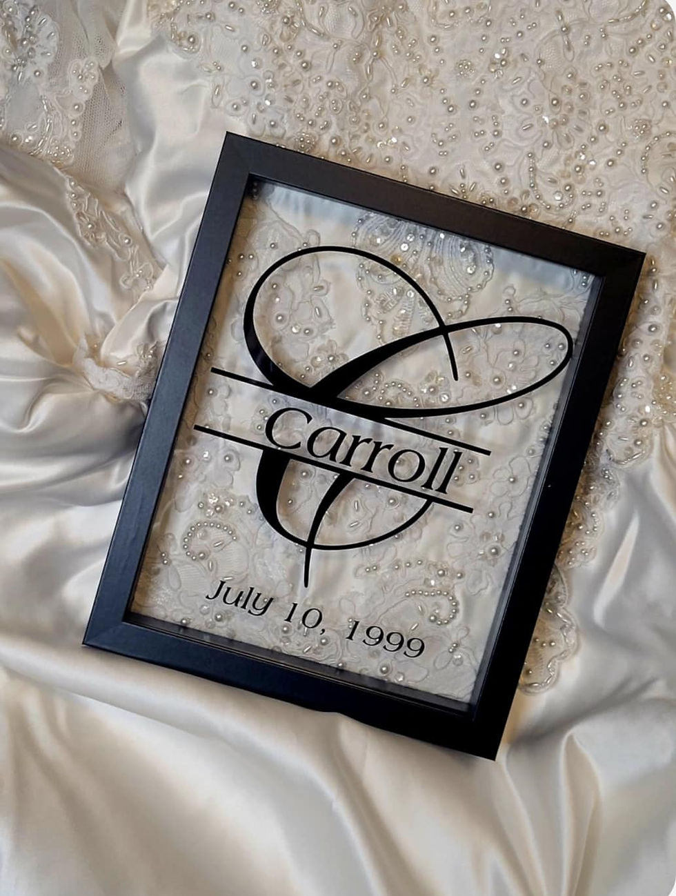 Thumbnail: Lace, satin, buttons, beadwork, or other treasured elements—arranged behind glass into a one-of-a-kind keepsake.