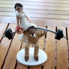 weight lifter wedding cake topper
