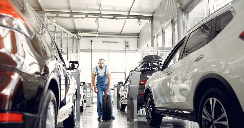 Mobile tire installation in progress for multiple vehicles at an Orange County home