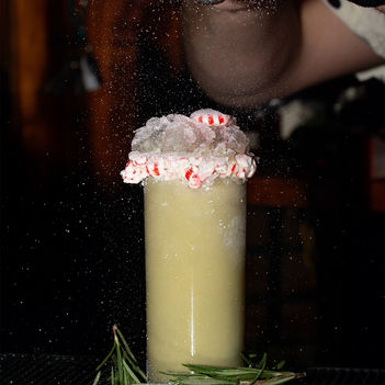 “You’re a Mean One” a beverage by Wander Bar Cocktail Lounge