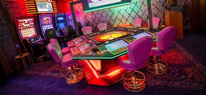 9 diamond palace casino roulette table and slots in the background.jpg