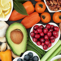 Selection of healthy foods: cranberries, avocado, blueberries, and pecans, at Sunflower Resort's Wellness Center