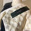 Thumbnail: Short sleeveless embossed jacket