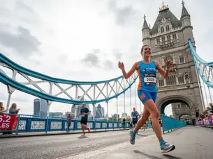 Woman running the marathon pain free after Shockwave Therapy