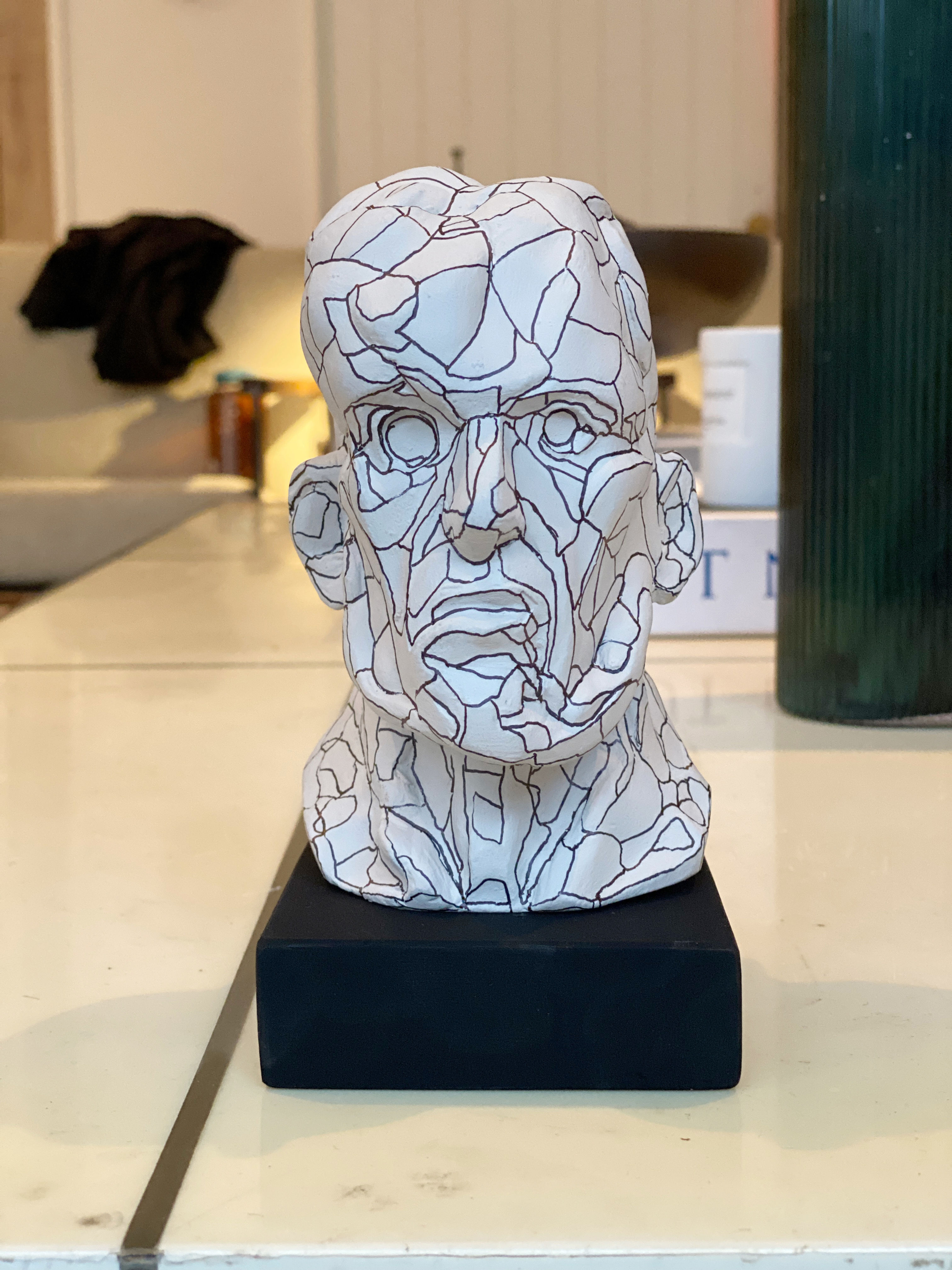 Miniature clay-cast plaster head