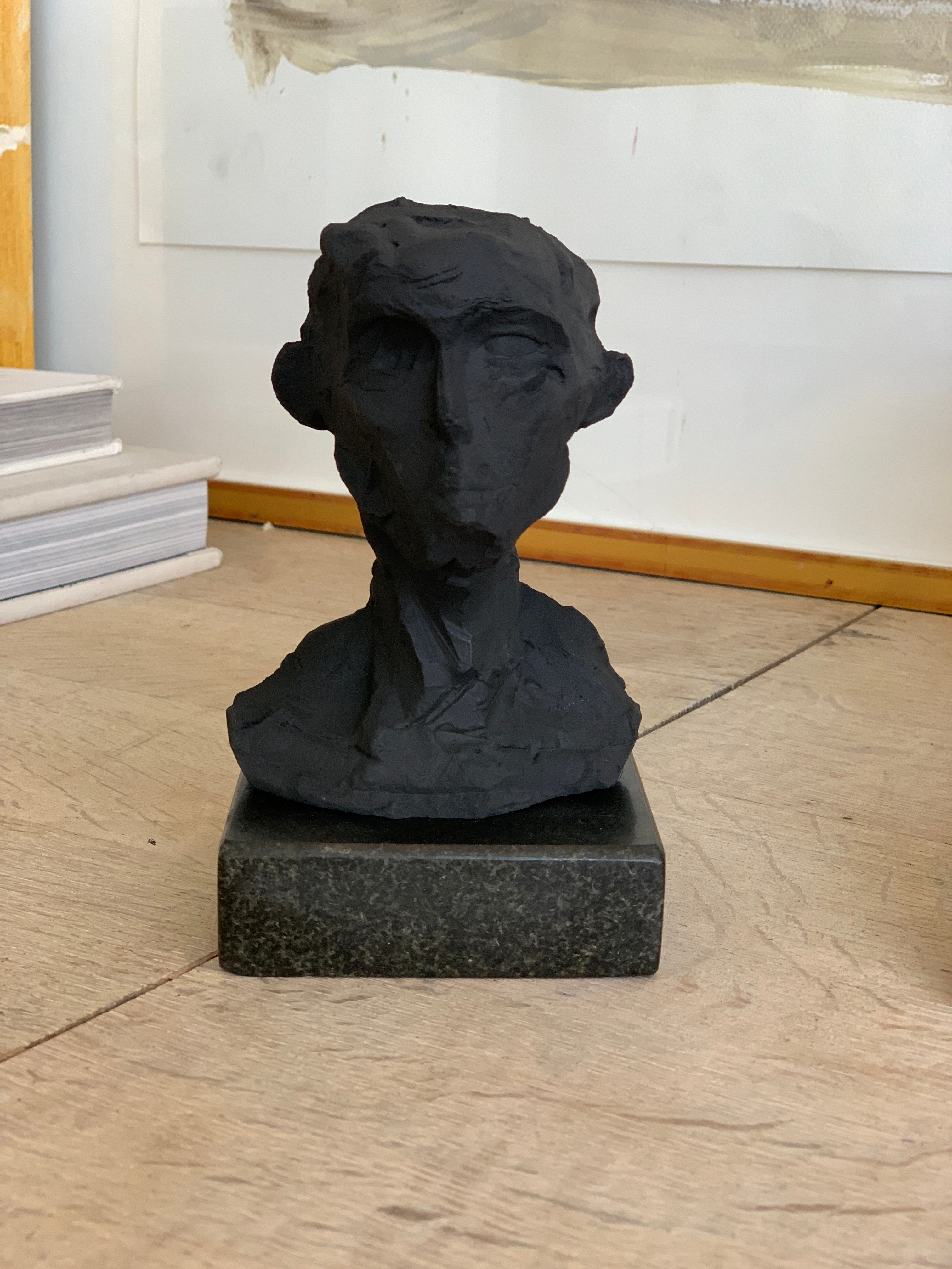 Miniature clay-cast plaster head