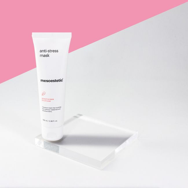 Thumbnail: Mesosystem anti-stress mask product on clear stand, modern background close up
