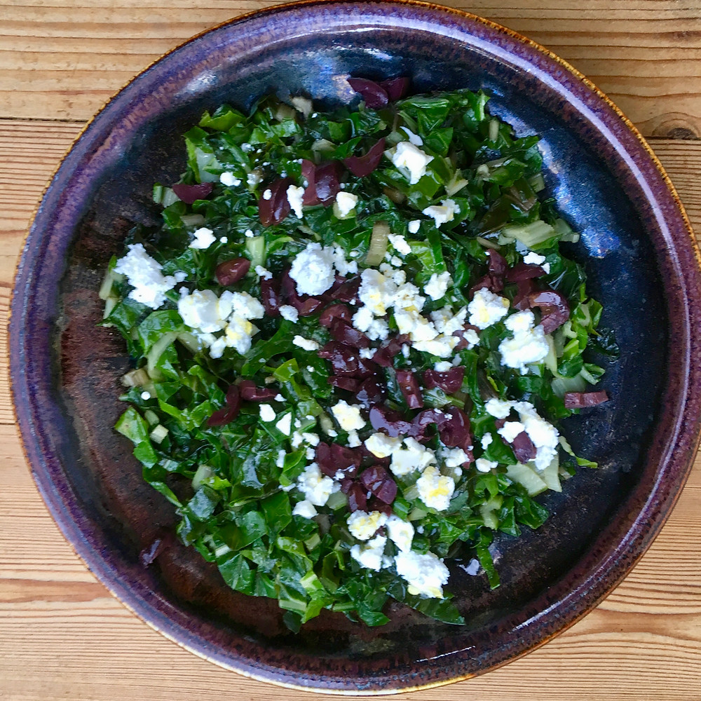 Spinach with olives and feta