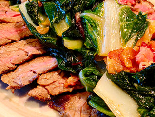 Grilled Skirt Steak with Garlic Bacon Swiss Chard