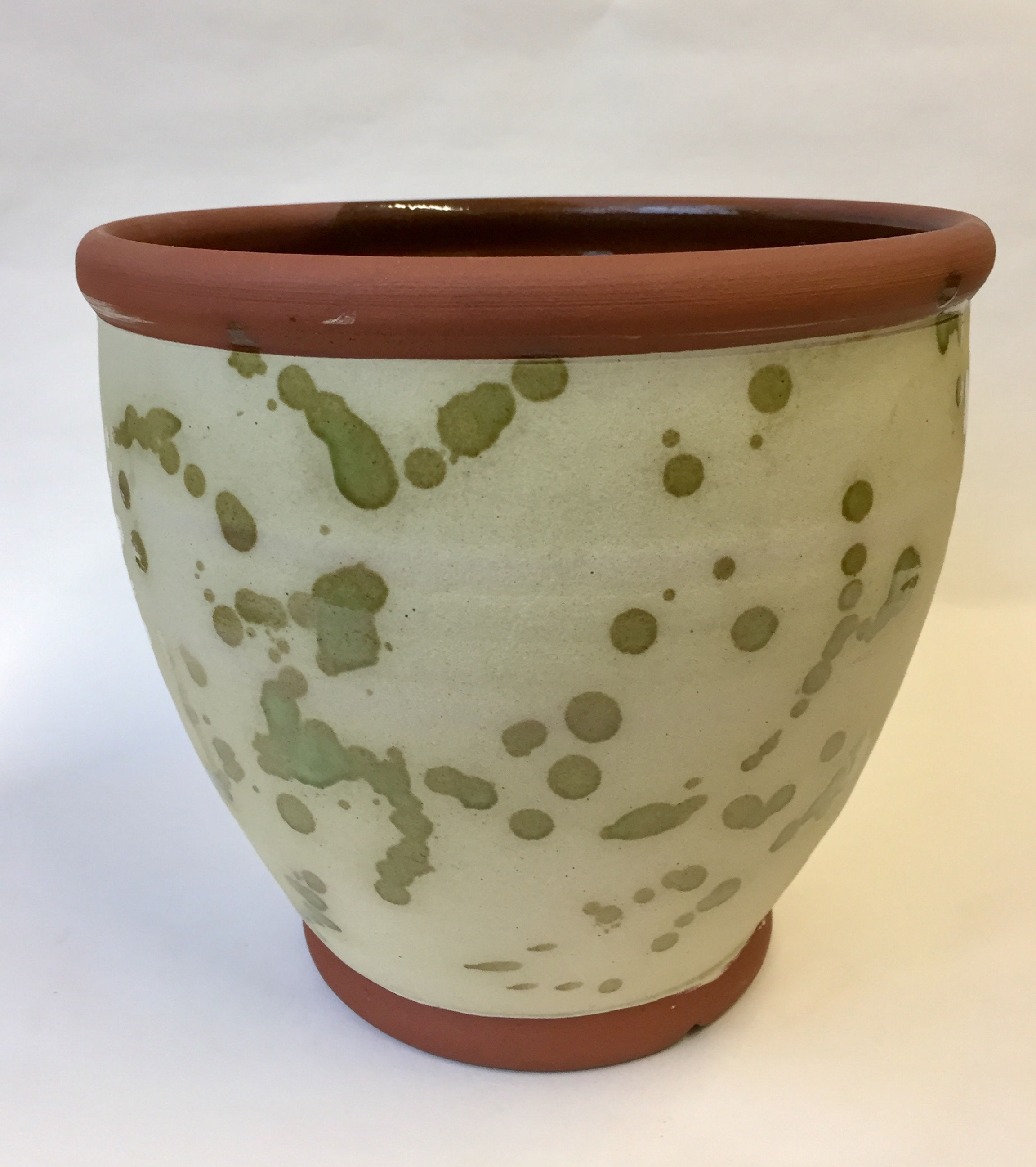 Planter with foot & green squiggle pattern