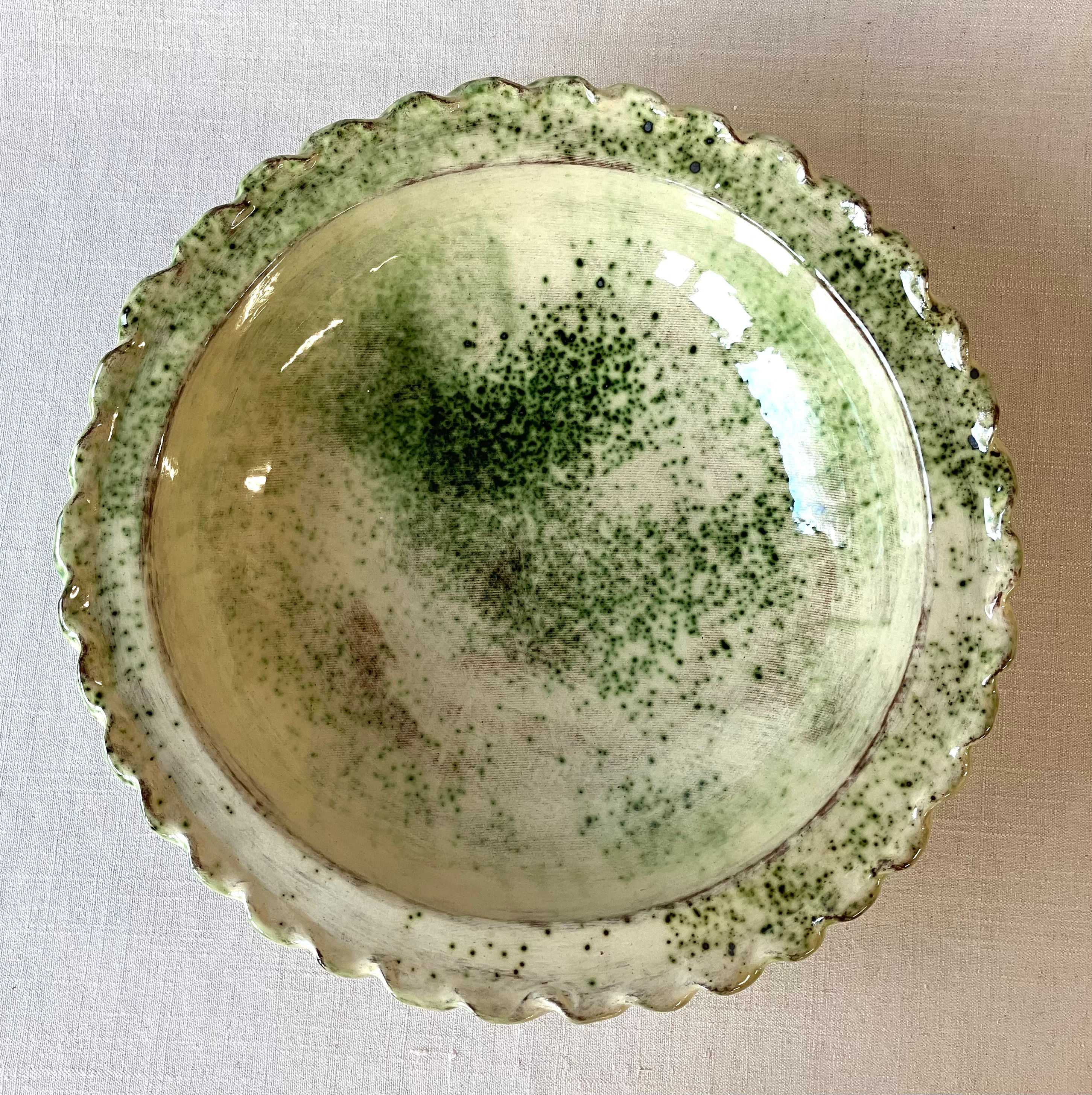 Large slab-moulded basin with rope rim and foot