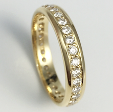 Jewellery Commission. Testimonial page. Diamonds set into a wedding band. Sentimental band ring redesign.