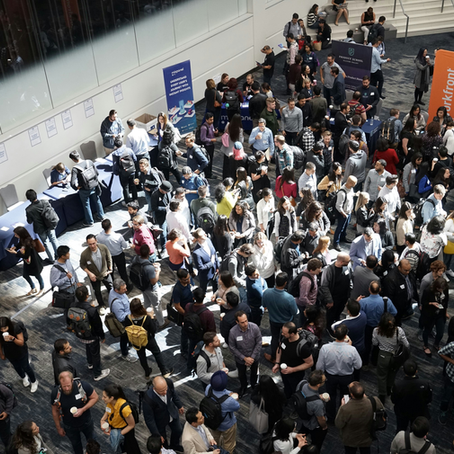A busy crowd connecting and engaging at networking events.
