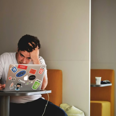  Man using laptop trying to build a marketing strategy.