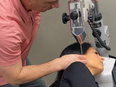 A patient receiving the gentle atlas orthogonal correction.