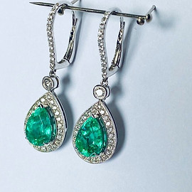 pear shape emerald and diamond halo white gold drop earrings