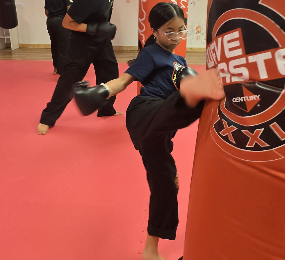 young girl practicing martial arts and lkickboxing in vero beach, fl at master dave's the house of warriors