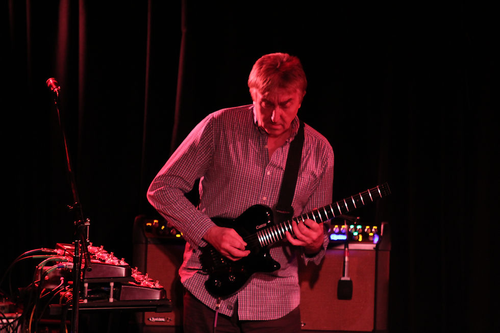 Jazz fusion guitarist playing on stage - Allan Holdsworth