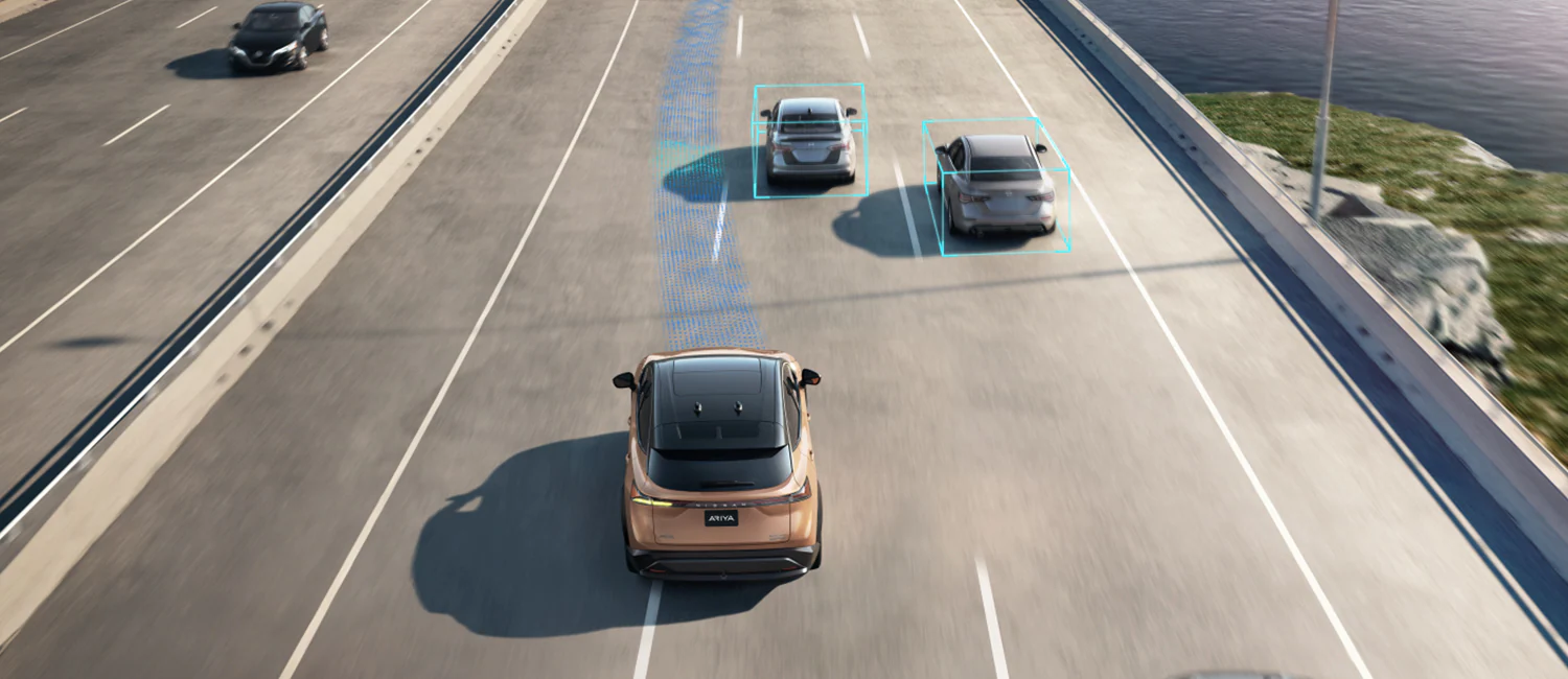2023-nissan-ariya-driving-on-highway.webp