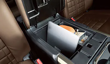2023-nissan-titan-deep-center-console-with-laptop-storage.webp