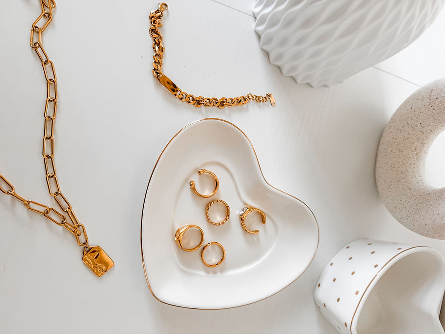 Gold chain necklaces and rings by Ivetticas Accesorios — contact us section