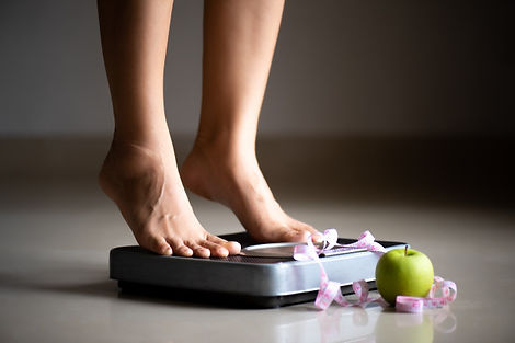 female-leg-stepping-weigh-scales-with-me