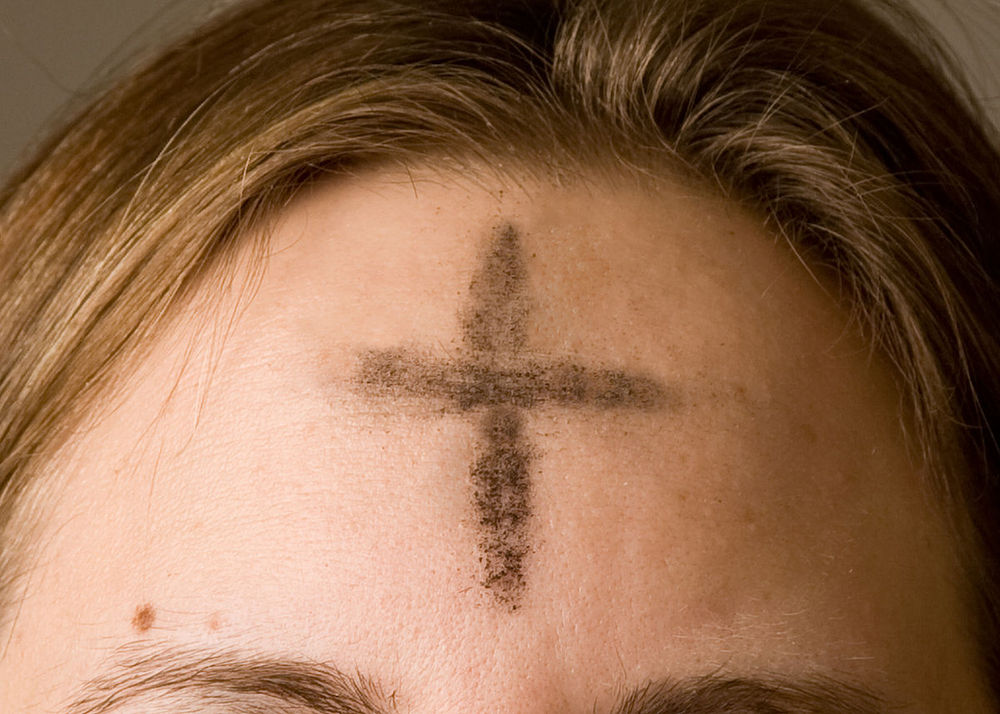 THAT CROSS ON YOUR FOREHEAD