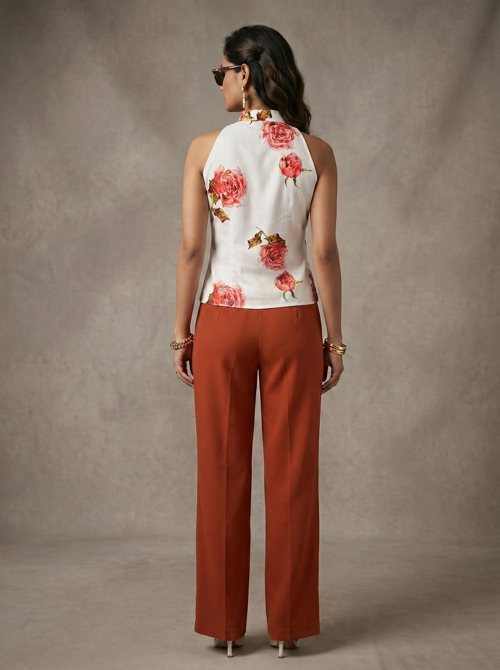 model wearing Floral Sleeveless Jacket-Style Top with korean pants