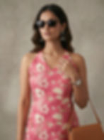 Model wearing pink halter neck short kurti top