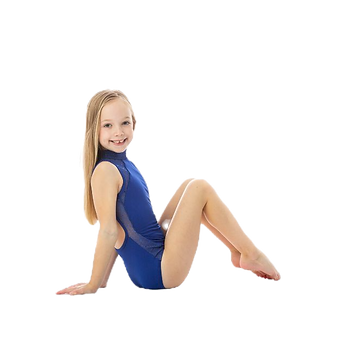 Dancer posing sitting on the ground with knees bent and toes pointed