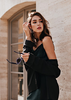 cute-young-girl-with-dark-wavy-hairstyle-bright-makeup-silk-dress-black-jacket-holding-sun