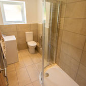 Contemporary shower room at Villa No. 3, designed with modern fixtures and clean lines.