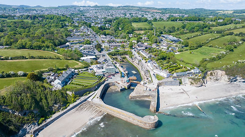 Charlestown Harbour near Le Dorney Villas, a beautifully preserved Georgian port with tall ships, artisan shops, and fresh seafood.