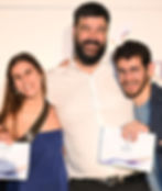 Shlomi with scholarship recipients.hoch.jpg