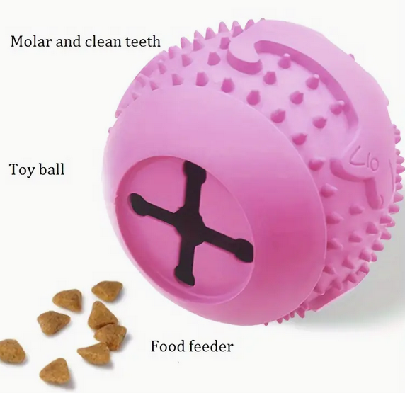 Thumbnail: Dog food dispensing ball in pink with treats falling out