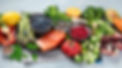 Healthy food selection on gray background. Detox and clean diet concept. Foods high in vit
